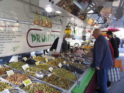 La Roche Posay market stall selling olives.