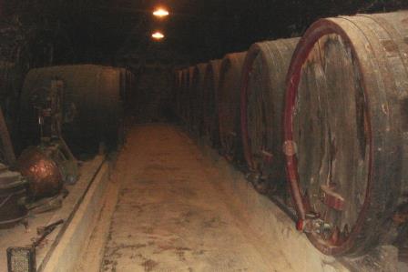 Wine barrels in the cave at Chateau de Breze in the Loire Valley