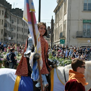 Joan of arc leads the parade at the festival in Orleans France