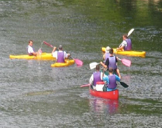 men in canoes on the river Creuse at Barrou