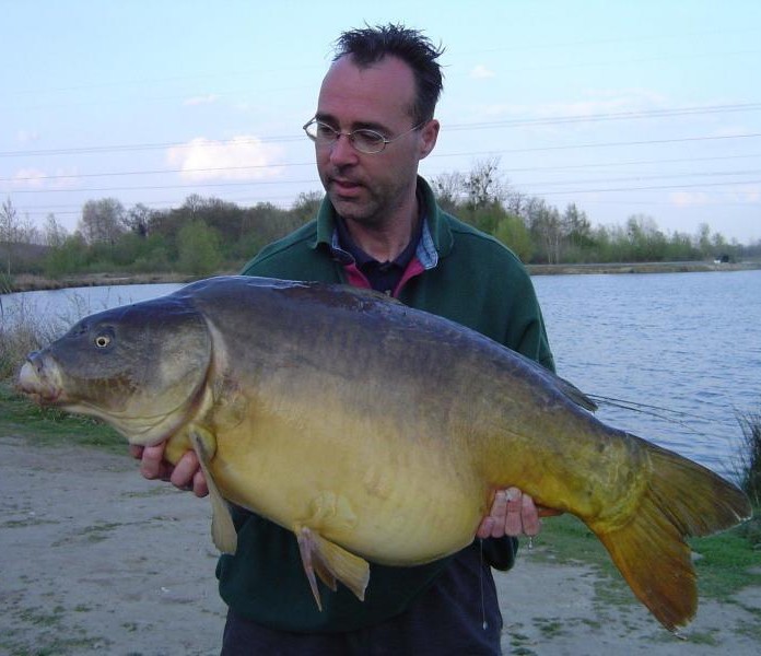 man holding large fish